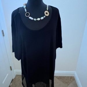 Black ChaCha Vente dress with see through hemline.